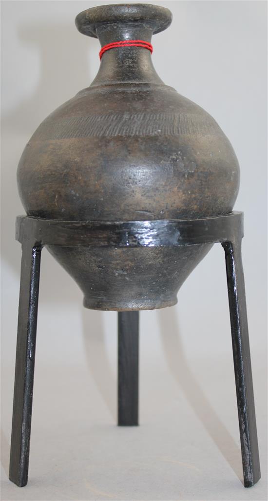 A Greek blackware bottle, Apulia, c.2nd century BC, 15cm, later metal stand